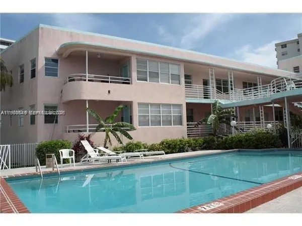 a front view of a building with balcony