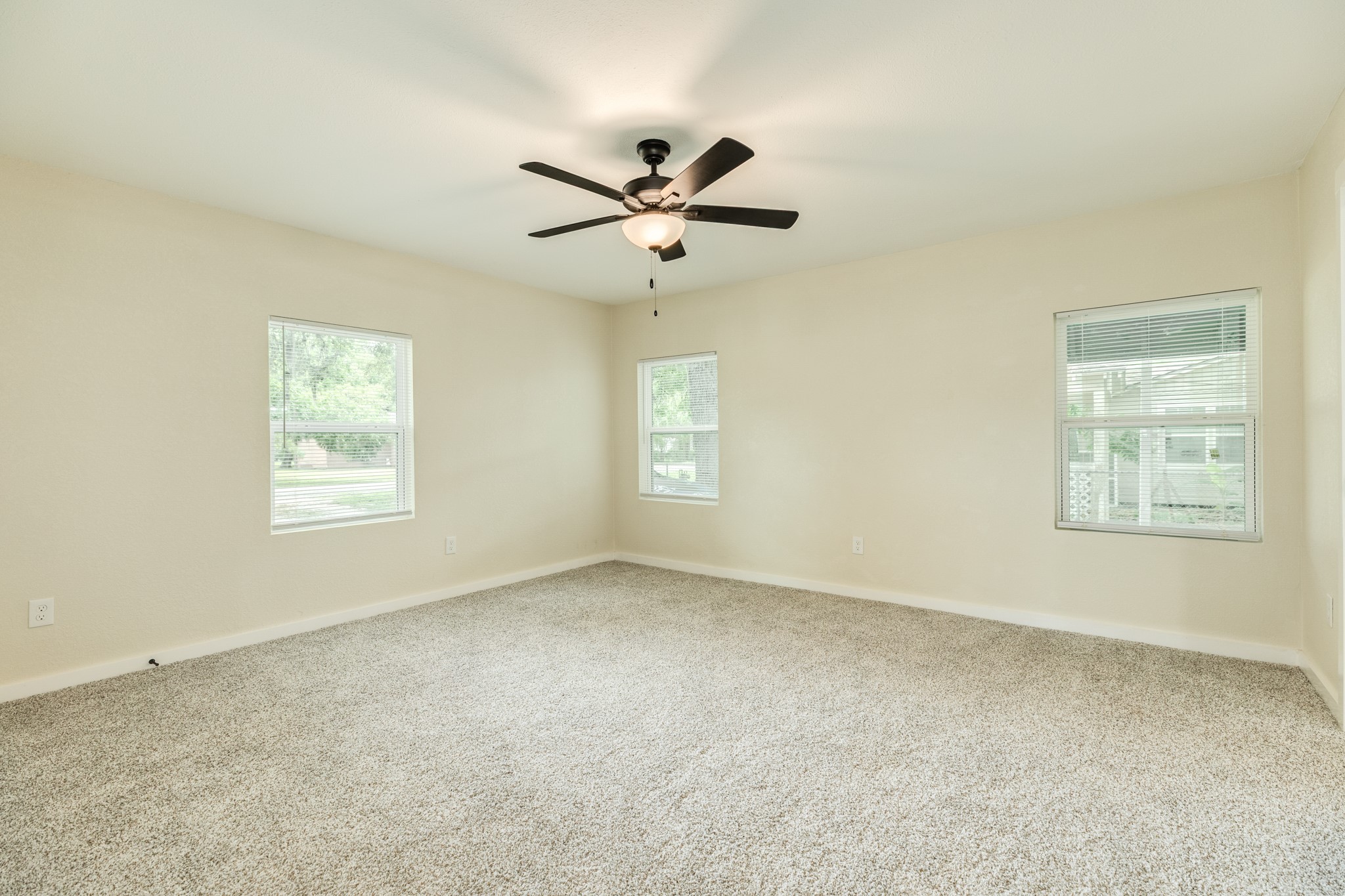 207 Stockman Street Sweeny, TX 77480 - Photo 15 of 22 a view of an empty room with a window