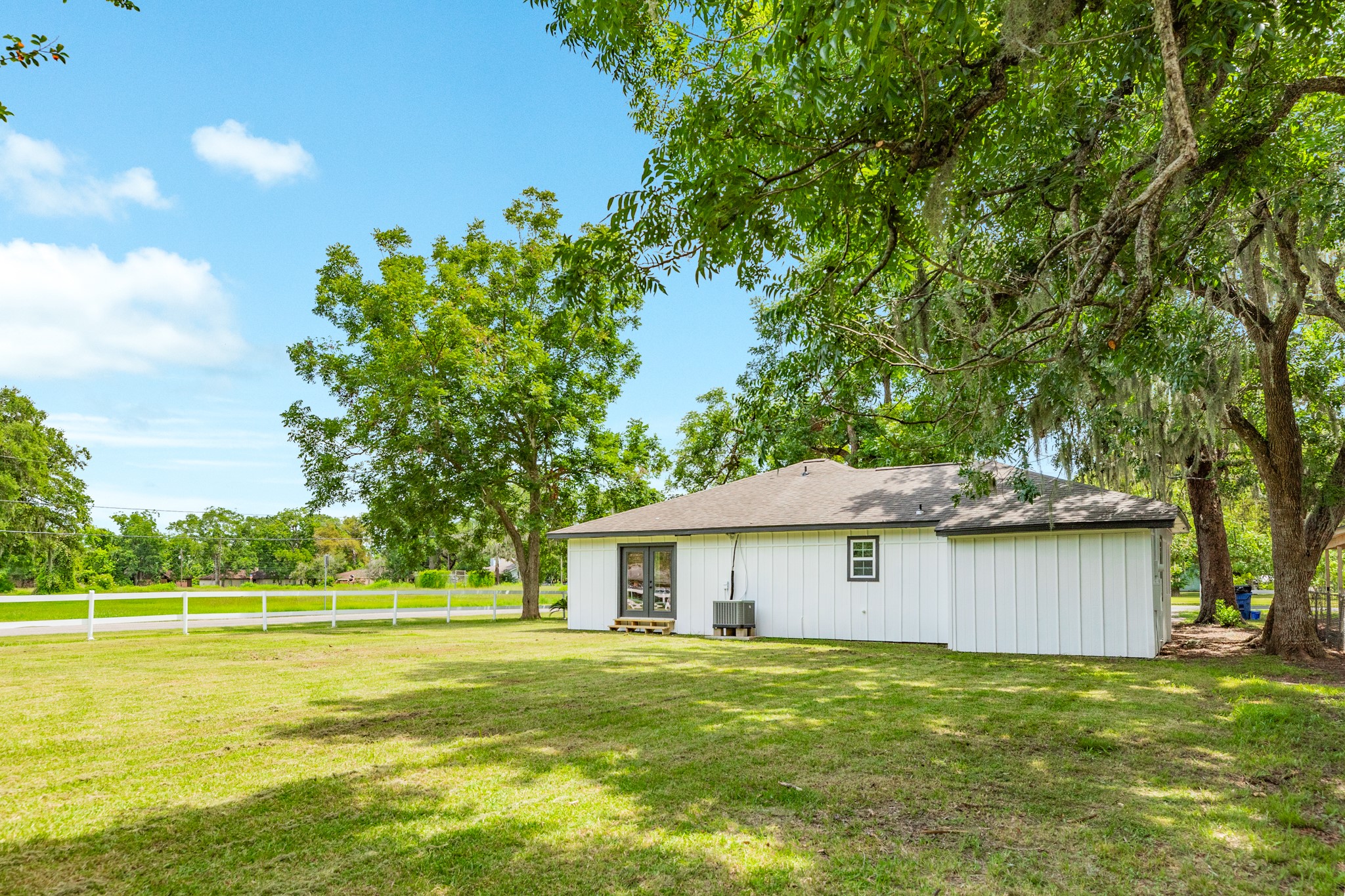 207 Stockman Street Sweeny, TX 77480 - Photo 6 of 22 a front view of a house with a garden