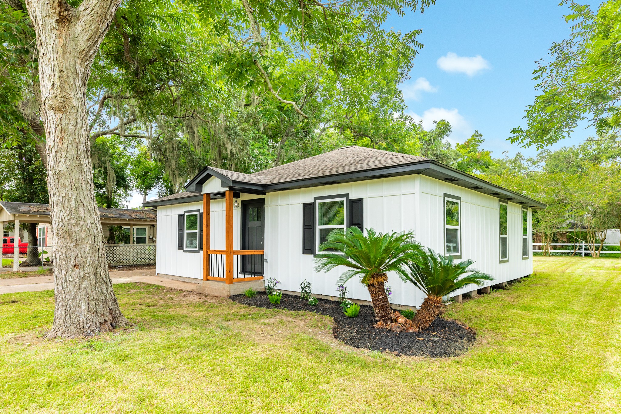 207 Stockman Street Sweeny, TX 77480 - Photo 8 of 22 a front view of house with yard and trees around