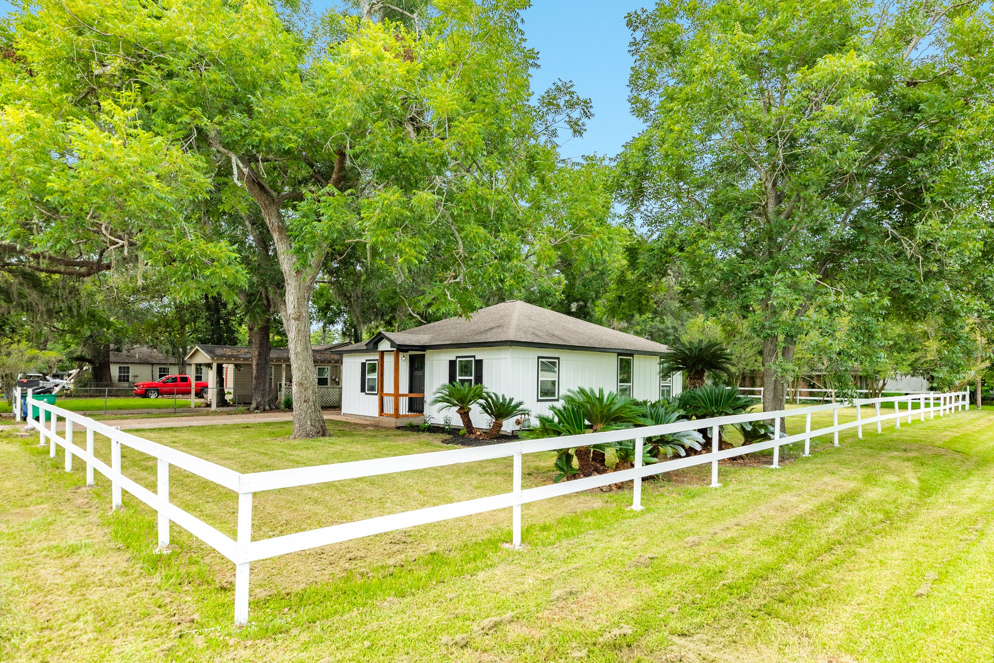207 Stockman Street Sweeny, TX 77480 - Photo 9 of 22 a view of a house with a swimming pool