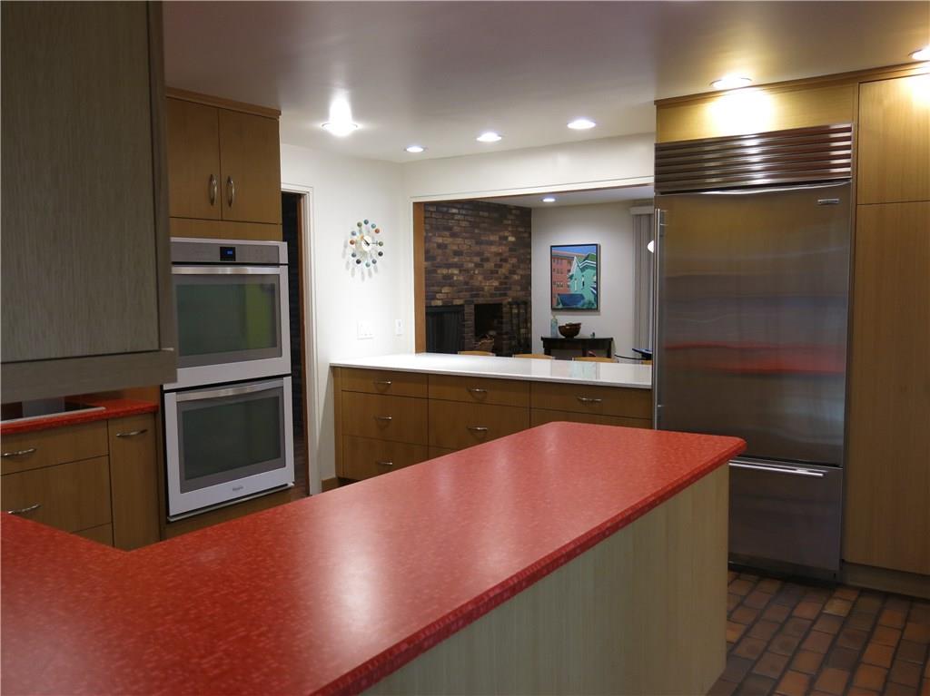 970 Segar Road Mt. Lebanon, PA 15243 - Photo 7 of 20 Kitchen looking onto the breakfast bar and a portion of the family room