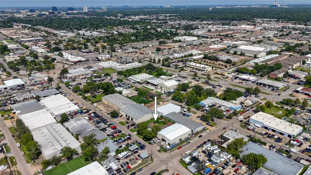 an aerial view of a city with lots of residential buildings