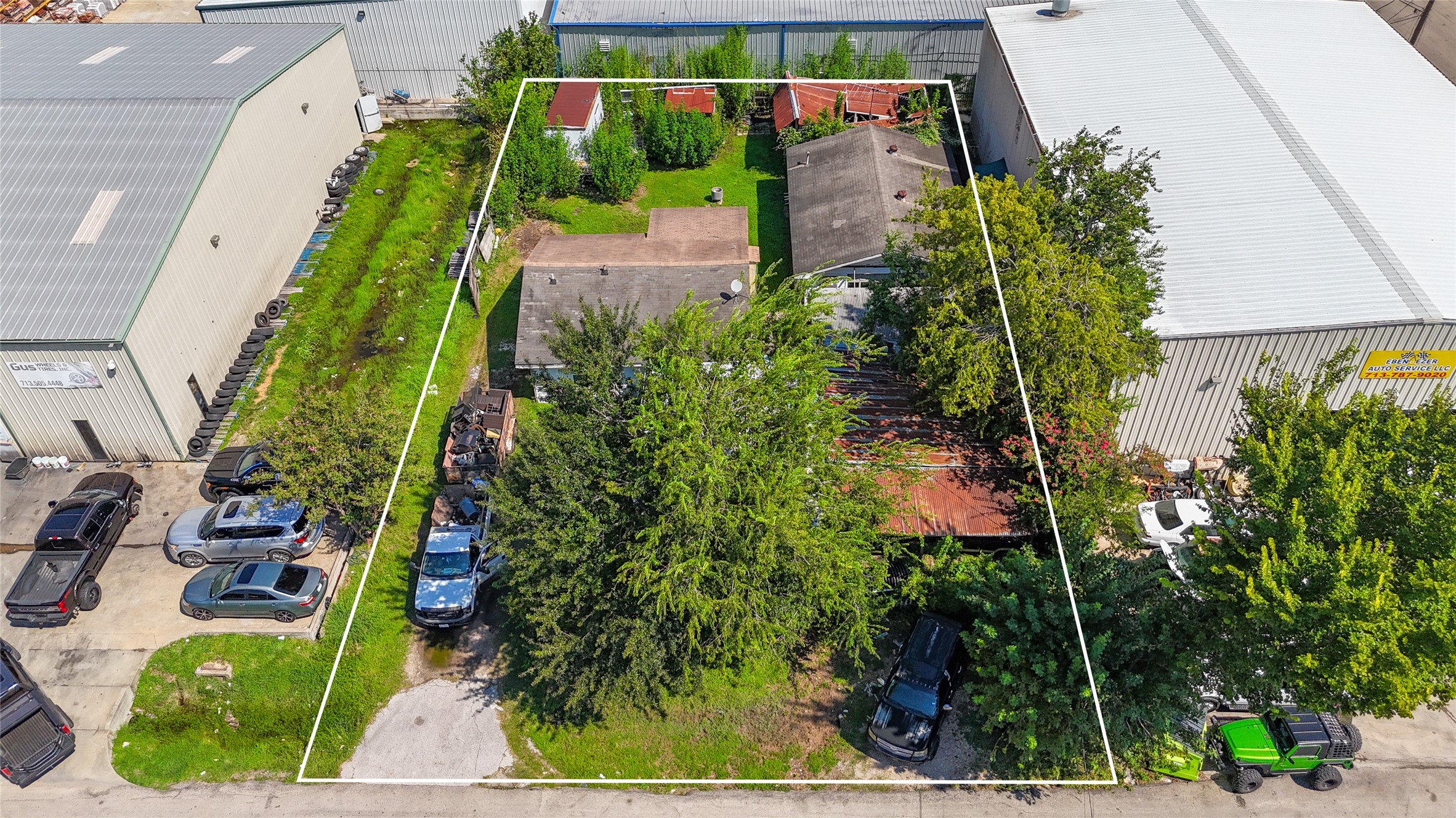 8710 Daffodil Street Houston, TX 77063 - Photo 6 of 7 an aerial view of a house with a yard and potted plants
