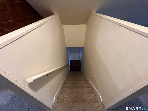 a view of a hallway with an empty space