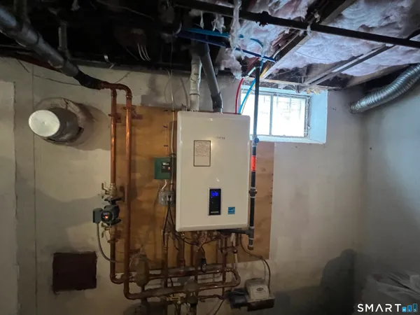 a bathroom with a shower and a sink