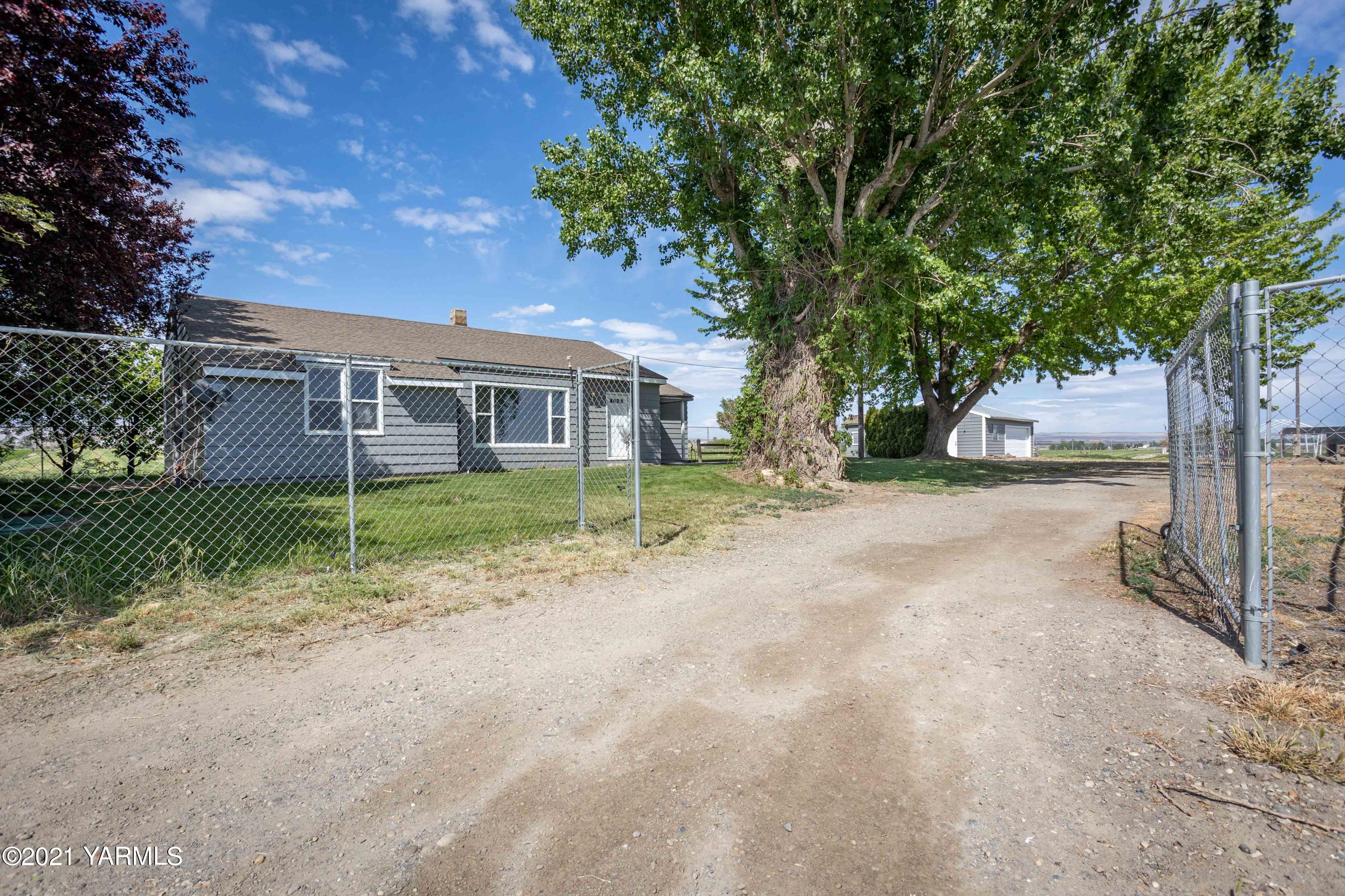 871 Reeves Road Outlook, WA 98938 - Photo 22 of 22 a view of a house with a yard