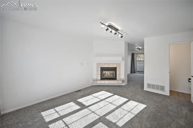 an empty room with windows