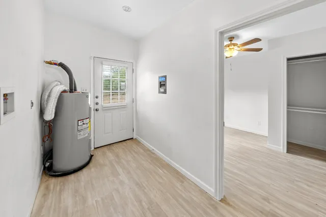 a view of a hardwood floor in a room
