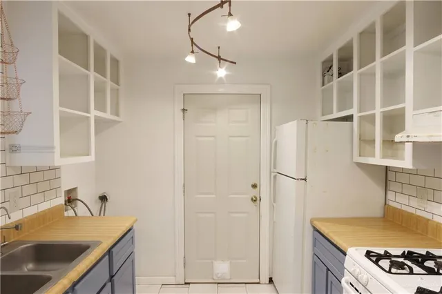 a bathroom with a sink and a shower