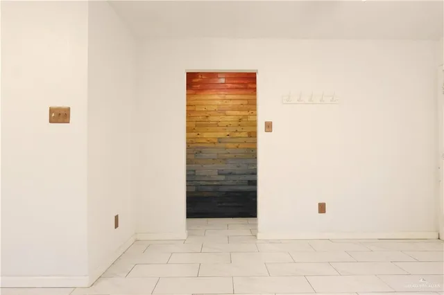 a bathroom with a sink a toilet and shower curtain