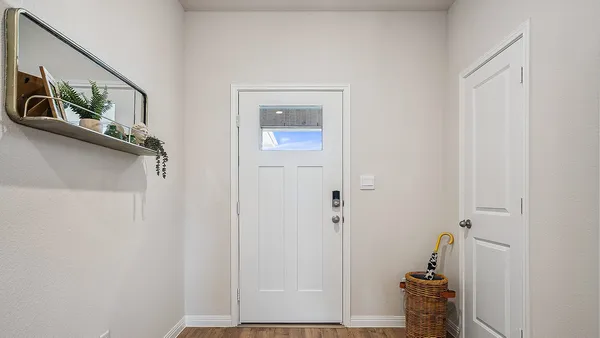 a view of a hallway with closet