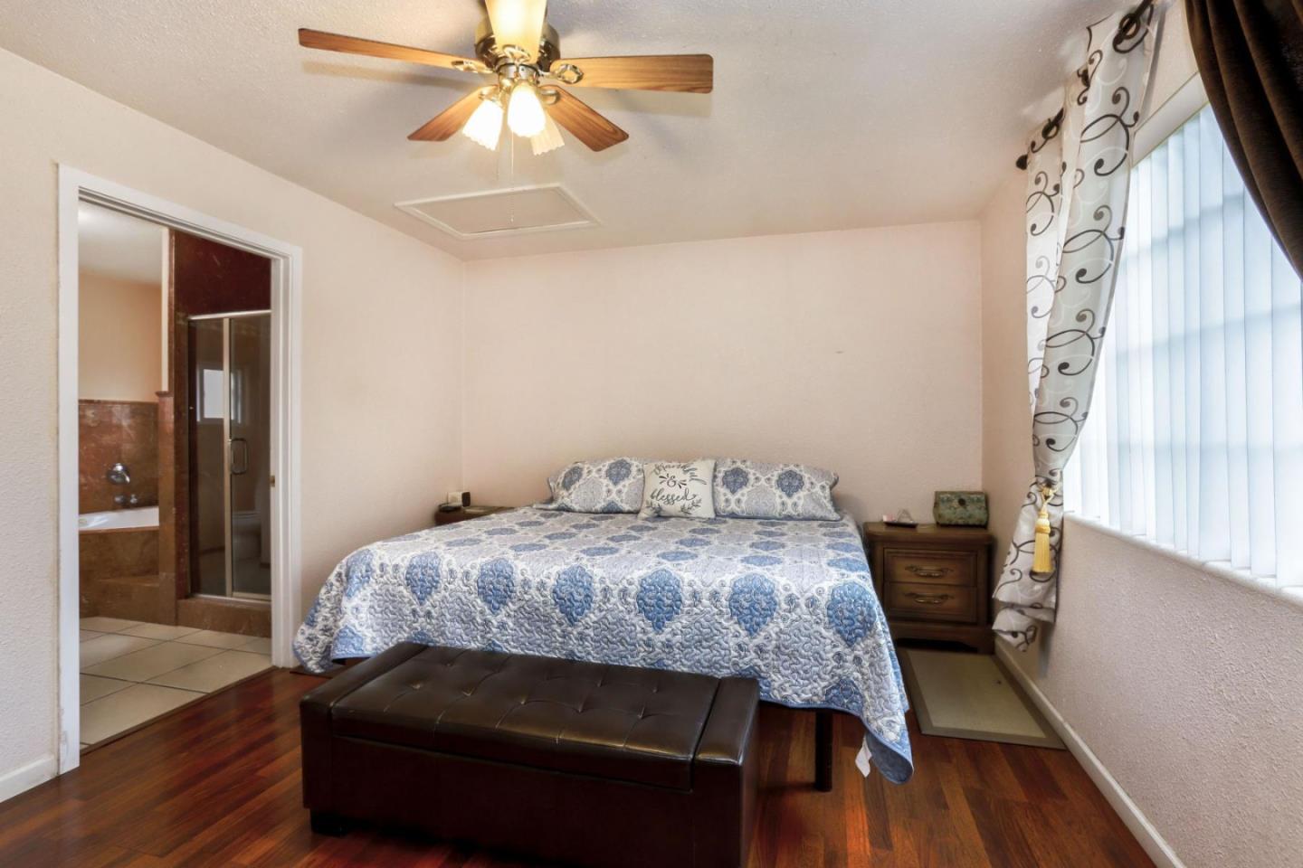 746 Echo Valley Road Salinas, CA 93907 - Photo 23 of 54 a bedroom with a bed and a window