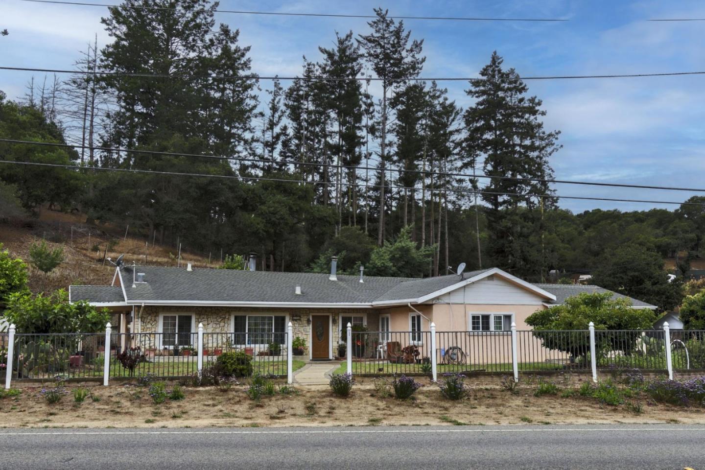 746 Echo Valley Road Salinas, CA 93907 - Photo 3 of 54 a front view of a house with a garden