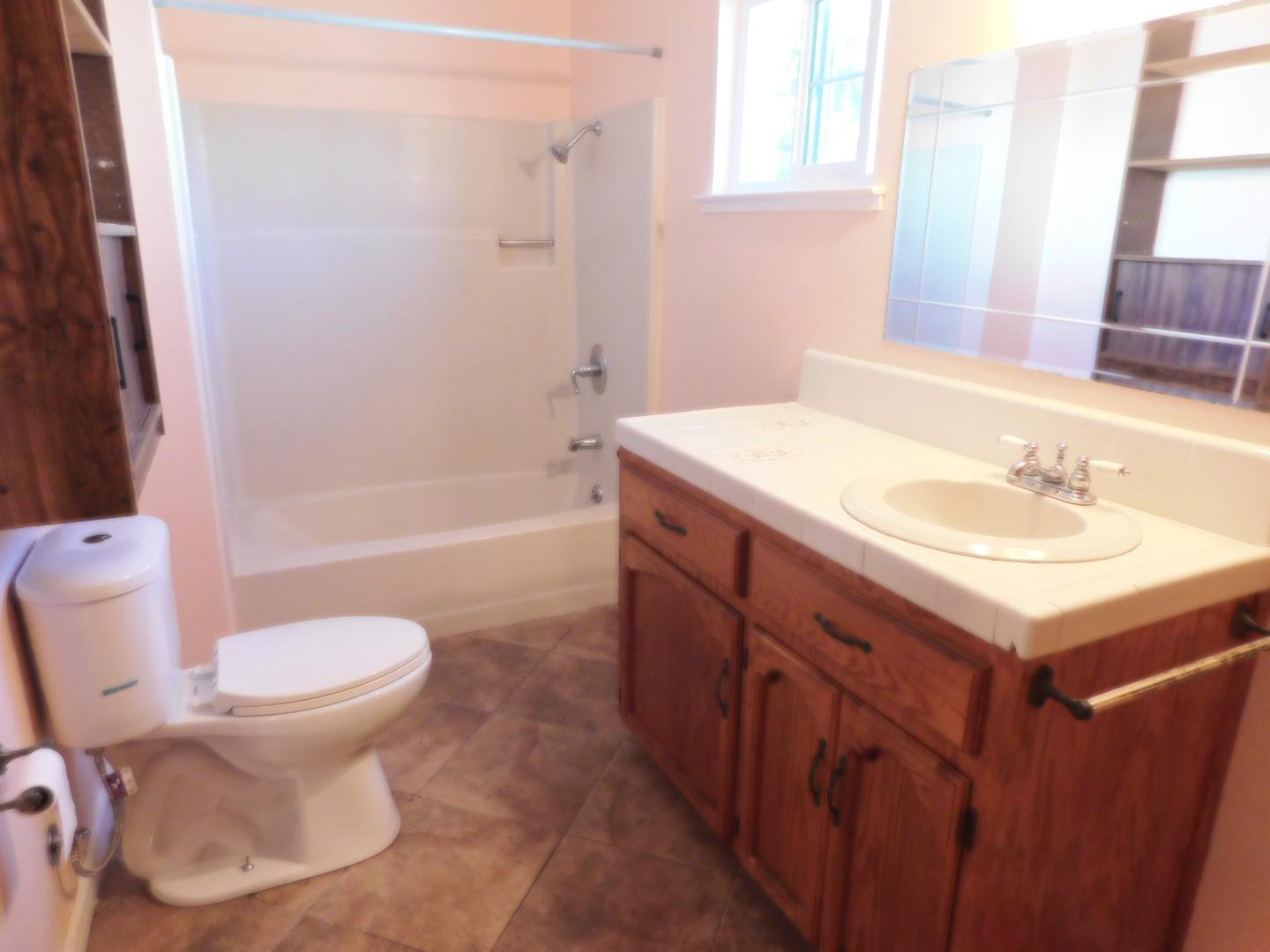 746 Echo Valley Road Salinas, CA 93907 - Photo 46 of 54 a bathroom with a sink toilet and shower