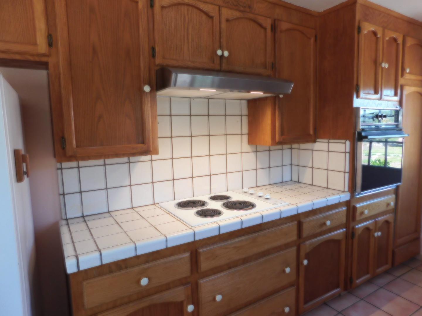 746 Echo Valley Road Salinas, CA 93907 - Photo 48 of 54 a kitchen with a sink cabinets and utility room