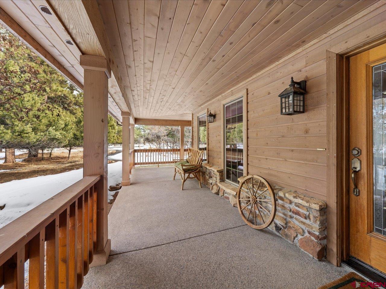 203 Puma Lane Ridgway, CO 81432 - Photo 13 of 43 a view of a porch with furniture
