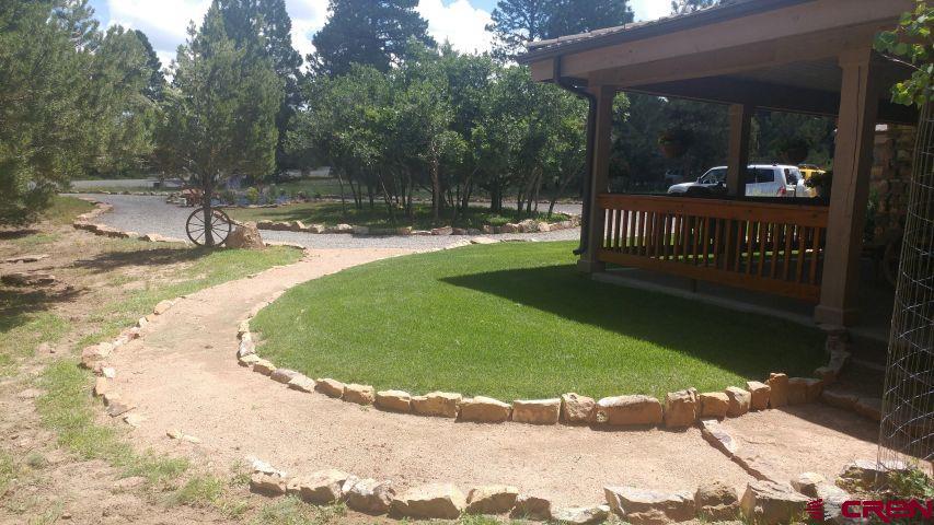 203 Puma Lane Ridgway, CO 81432 - Photo 2 of 43 a view of outdoor space yard and patio