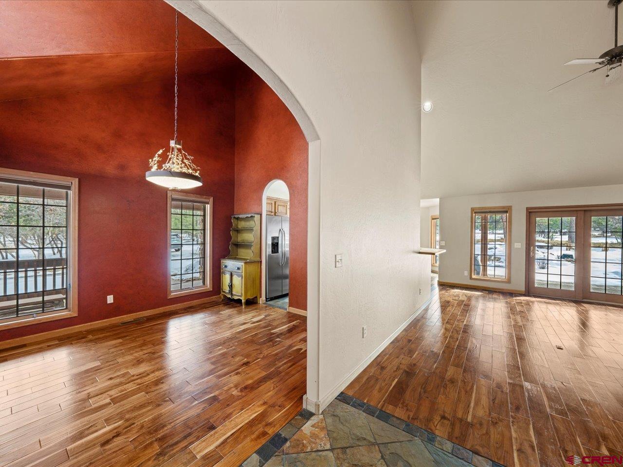203 Puma Lane Ridgway, CO 81432 - Photo 21 of 43 wooden floor in an empty room with a window