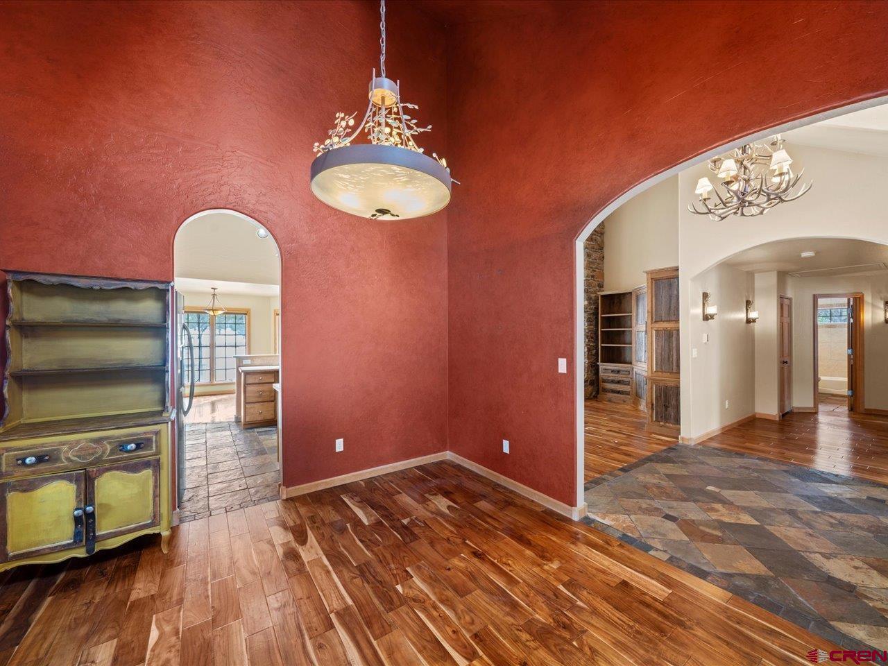 203 Puma Lane Ridgway, CO 81432 - Photo 22 of 43 a view of a livingroom with wooden floor and workspace