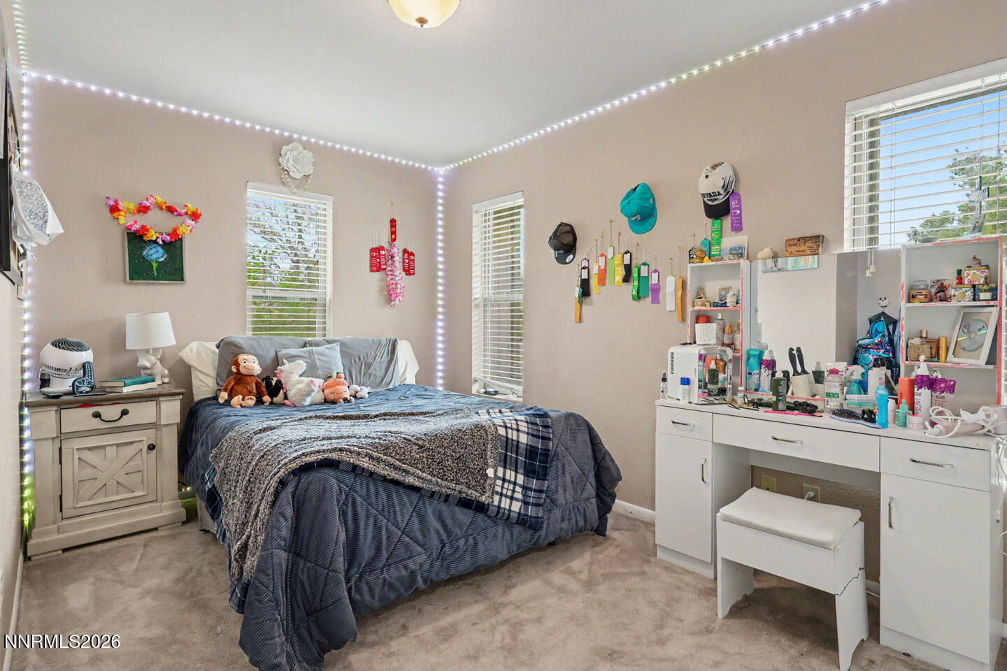 1500 Manchester Circle Fallon, NV 89406 - Photo 14 of 41 a bedroom with a bed and a desk