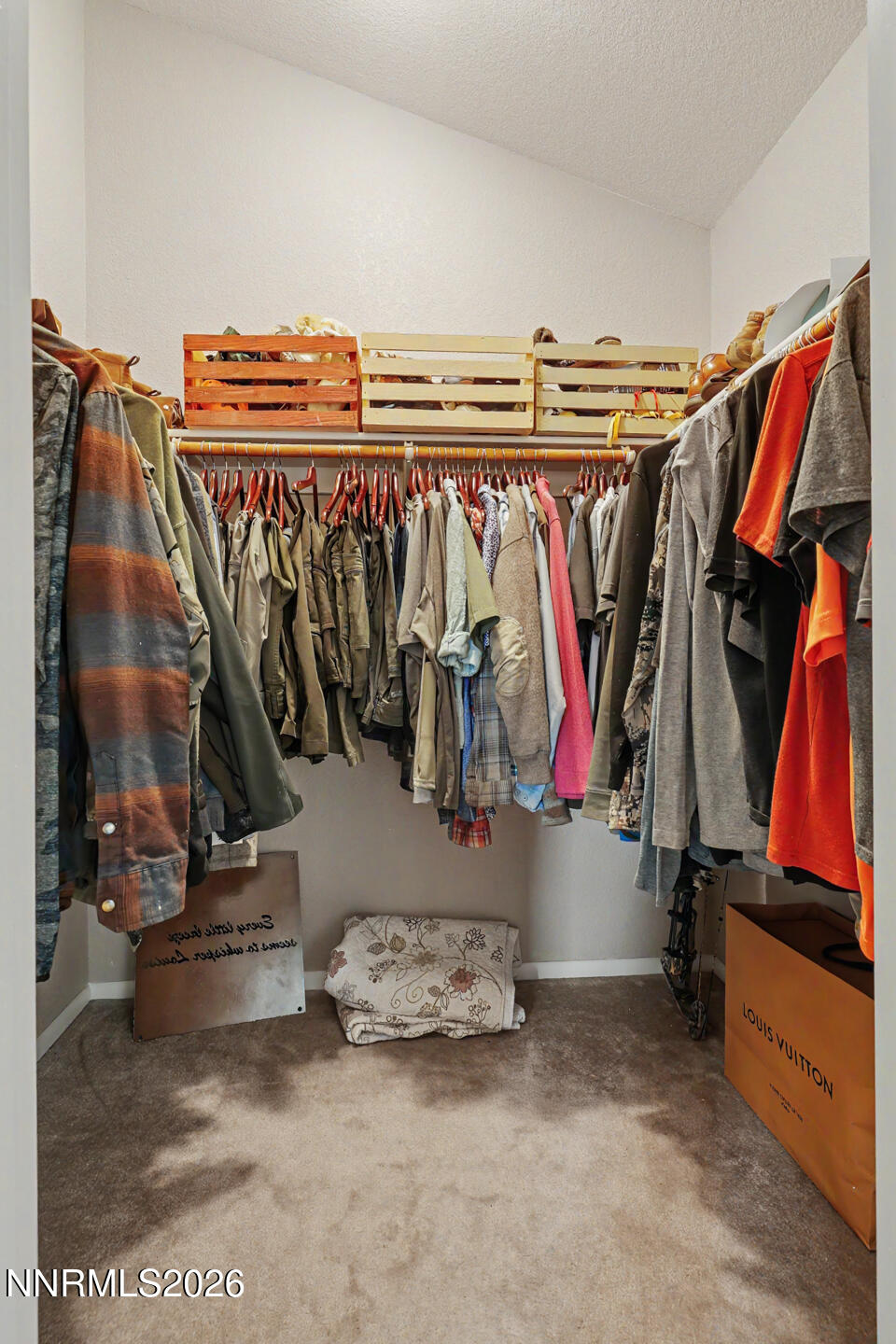 1500 Manchester Circle Fallon, NV 89406 - Photo 20 of 41 a view of walk in closet with clothes and shoes