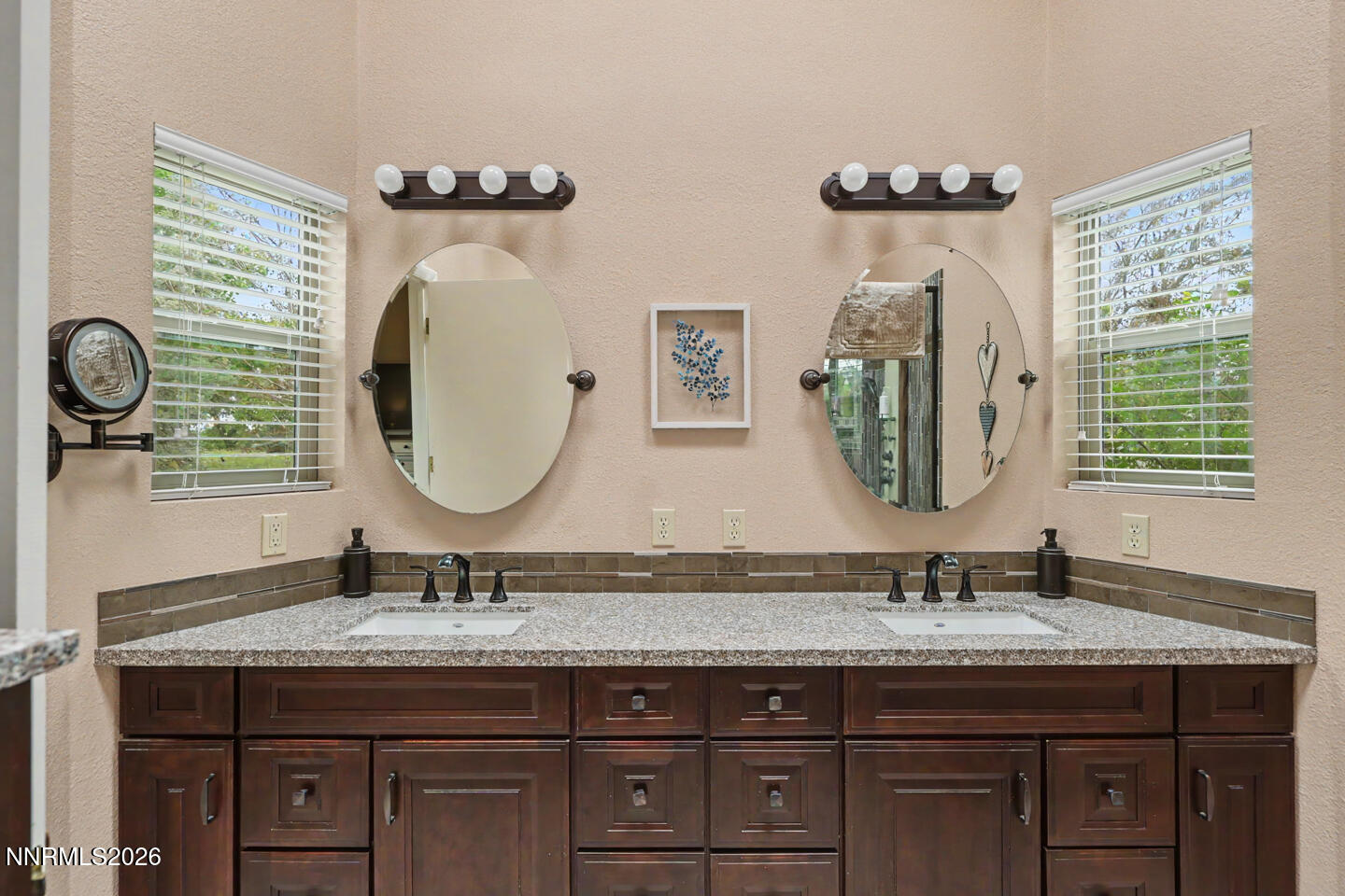 1500 Manchester Circle Fallon, NV 89406 - Photo 24 of 41 a bathroom with a granite countertop double vanity sink and a mirror