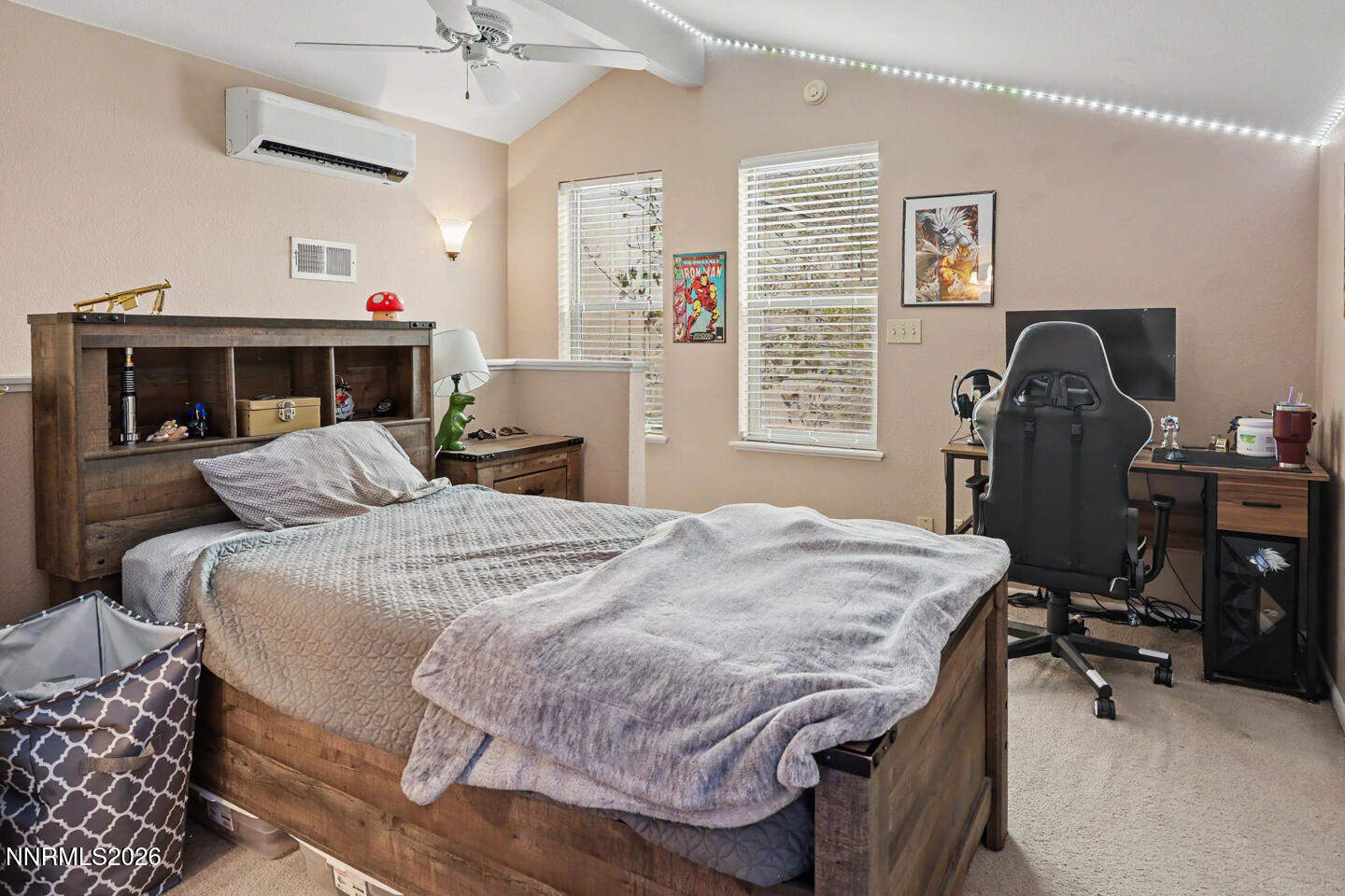 1500 Manchester Circle Fallon, NV 89406 - Photo 27 of 41 a bedroom with a bed and wooden floor