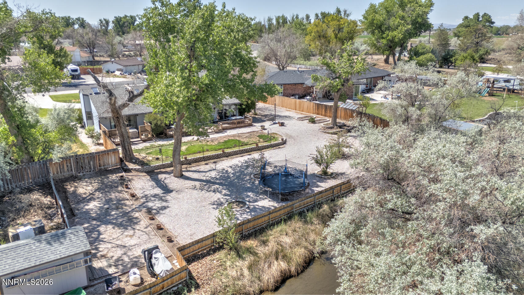 1500 Manchester Circle Fallon, NV 89406 - Photo 35 of 41 a view of a swimming pool with a patio and a yard