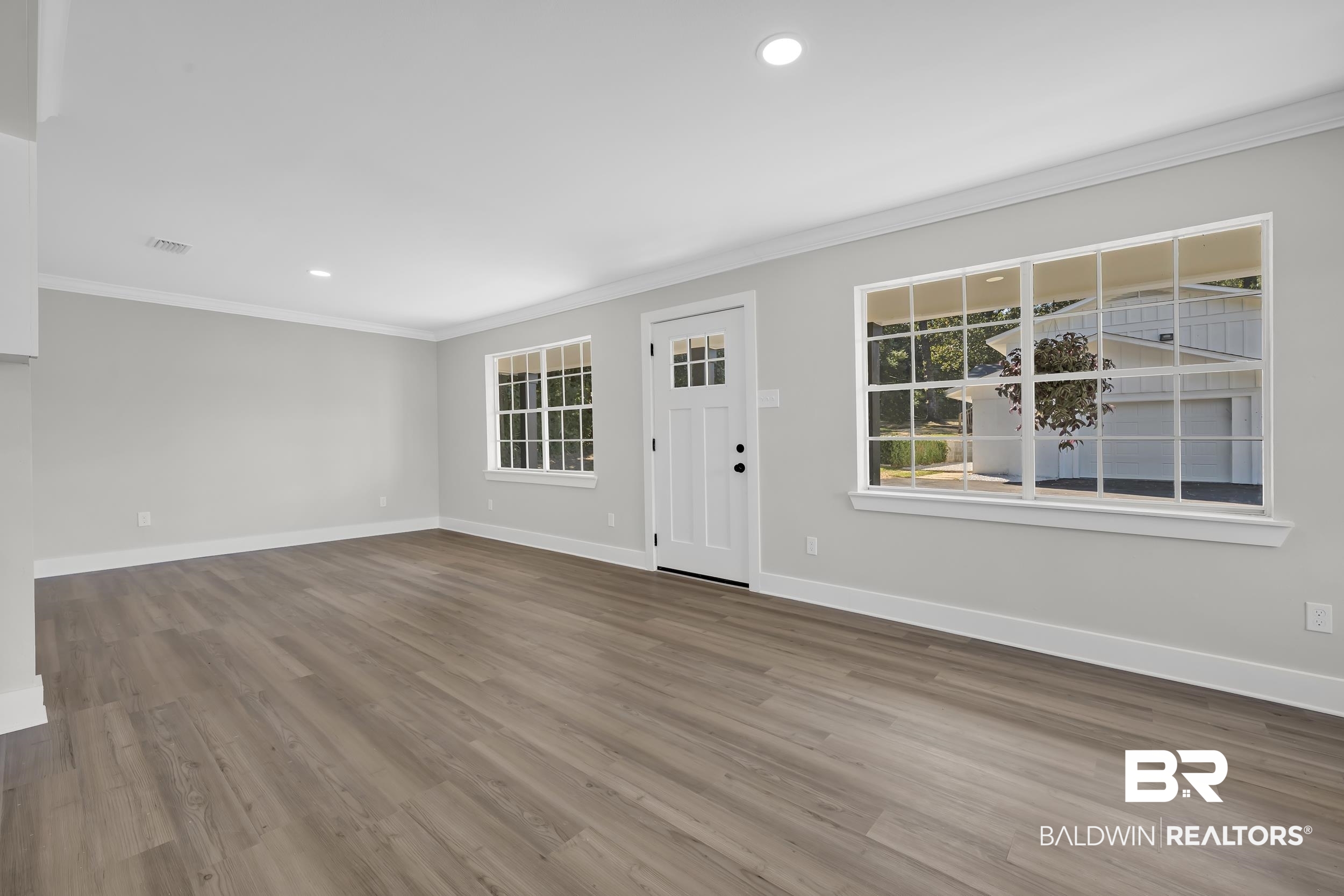 8351 Theodore Dawes Road Theodore, AL 36582 - Photo 29 of 46 Foyer entrance with ornamental molding, recessed lighting, and light wood-type flooring