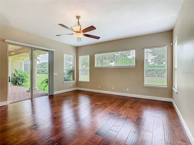 a view of a kitchen with a sink and a window