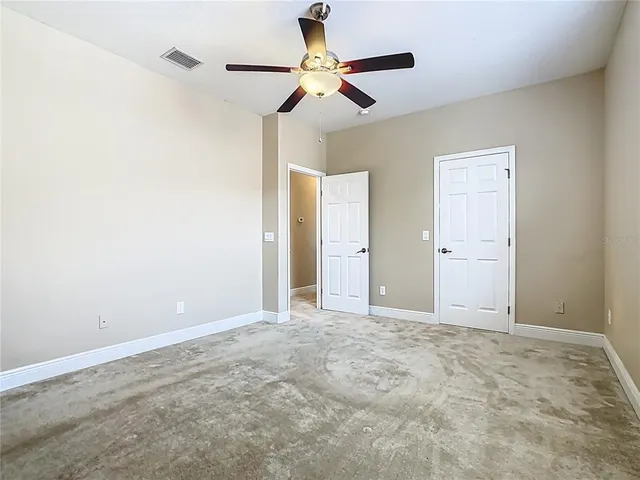 a view of a room with windows