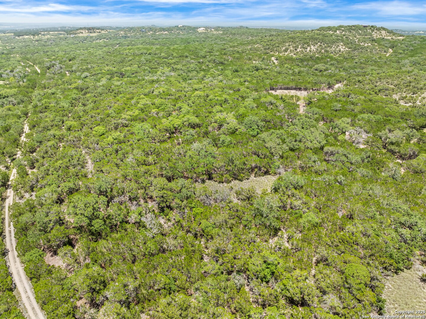 a view of a field with an outdoor space