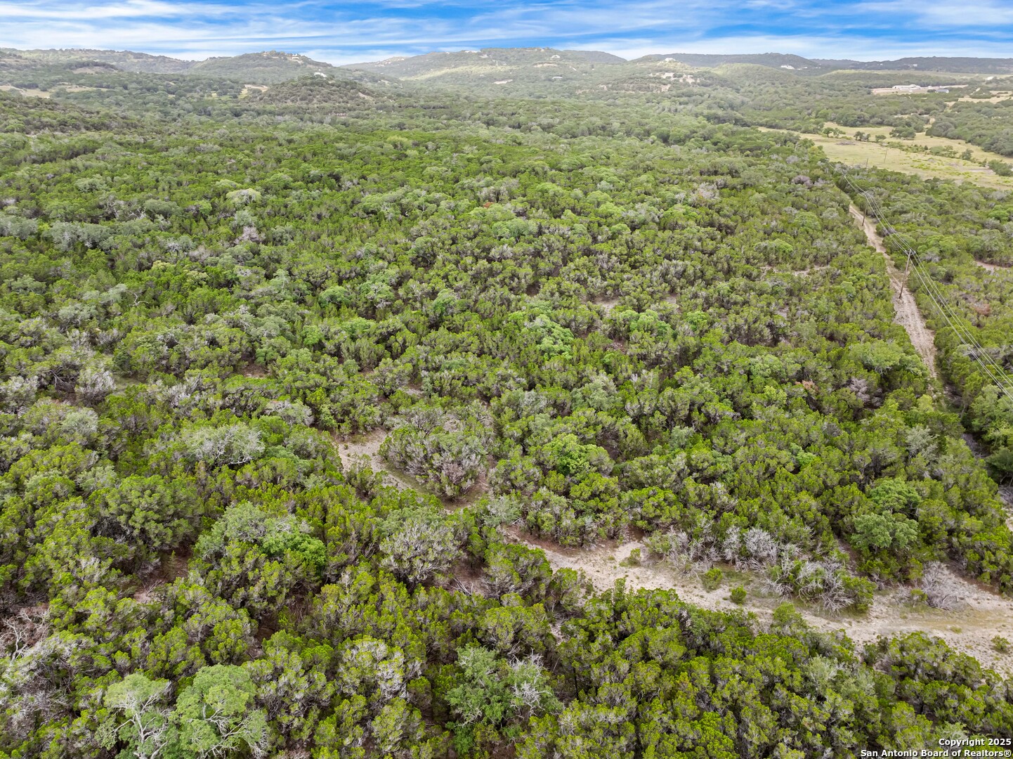 311 Spanish Pass Road Boerne, TX 78006 - Photo 3 of 8 a view of a yard with an outdoor space