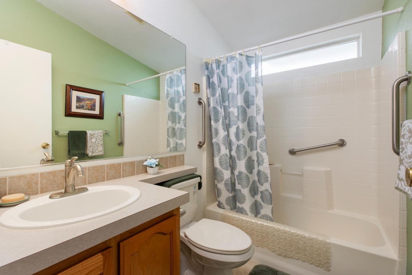 100 North Rodeo Gulch Road, Unit 63 Soquel, CA 95073 - Photo 11 of 21 a bathroom with a sink toilet and shower