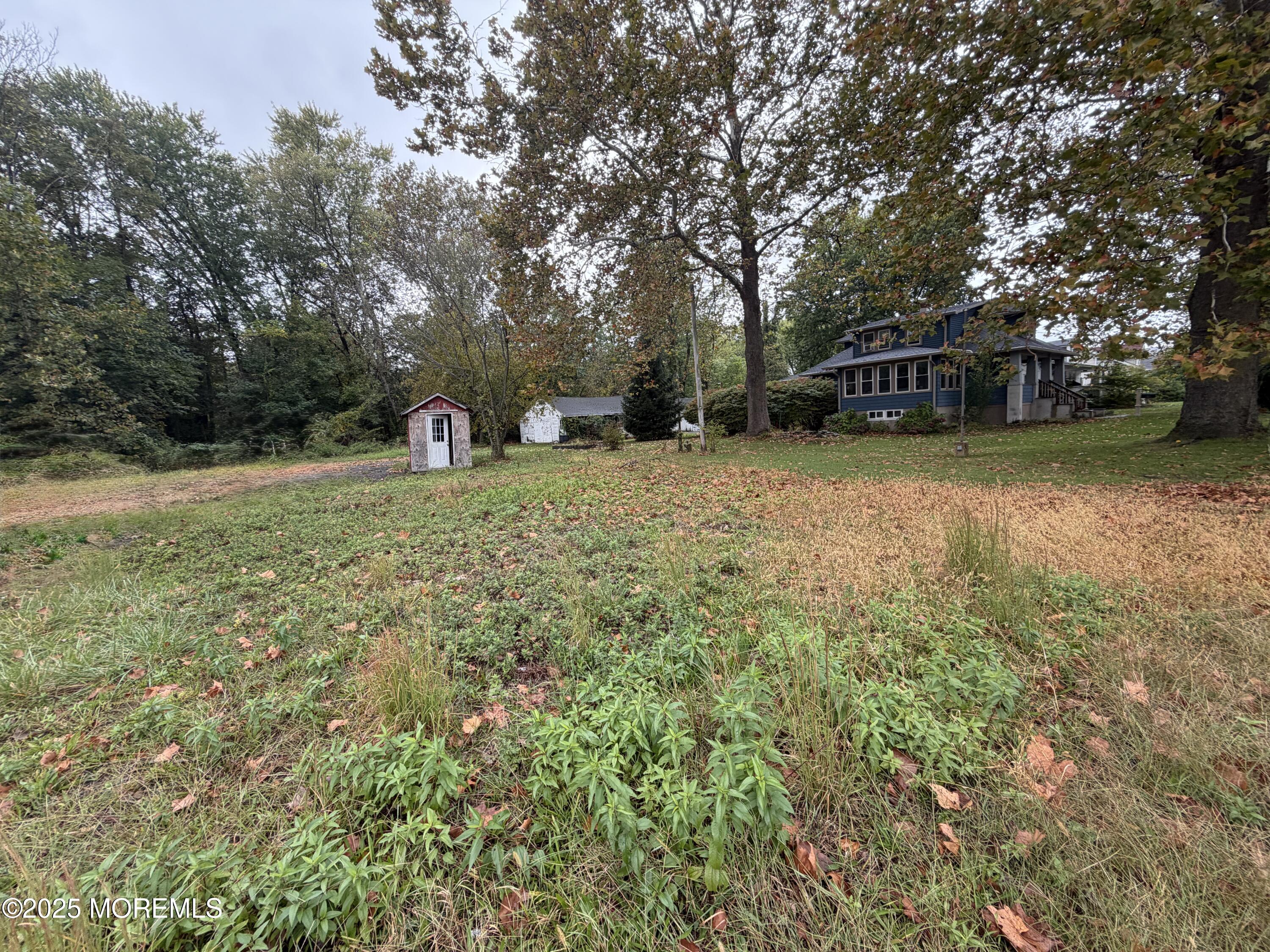 Undefined Lakewood Farmingdale Road Farmingdale, NJ 07727 - Photo 2 of 10 a front view of a house with a yard