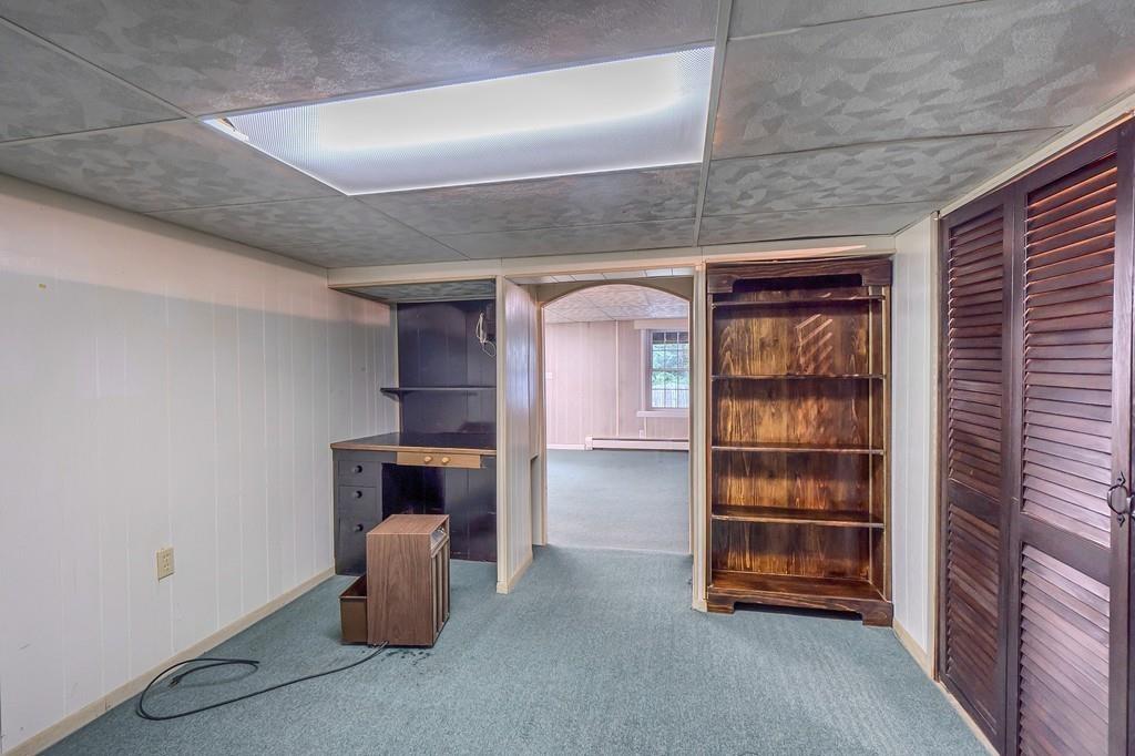 150 Pine Street Manchester, MA 01944 - Photo 24 of 38 a room with furniture and window