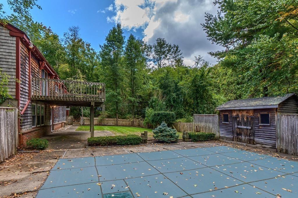 150 Pine Street Manchester, MA 01944 - Photo 33 of 38 a view of house with outdoor space and porch