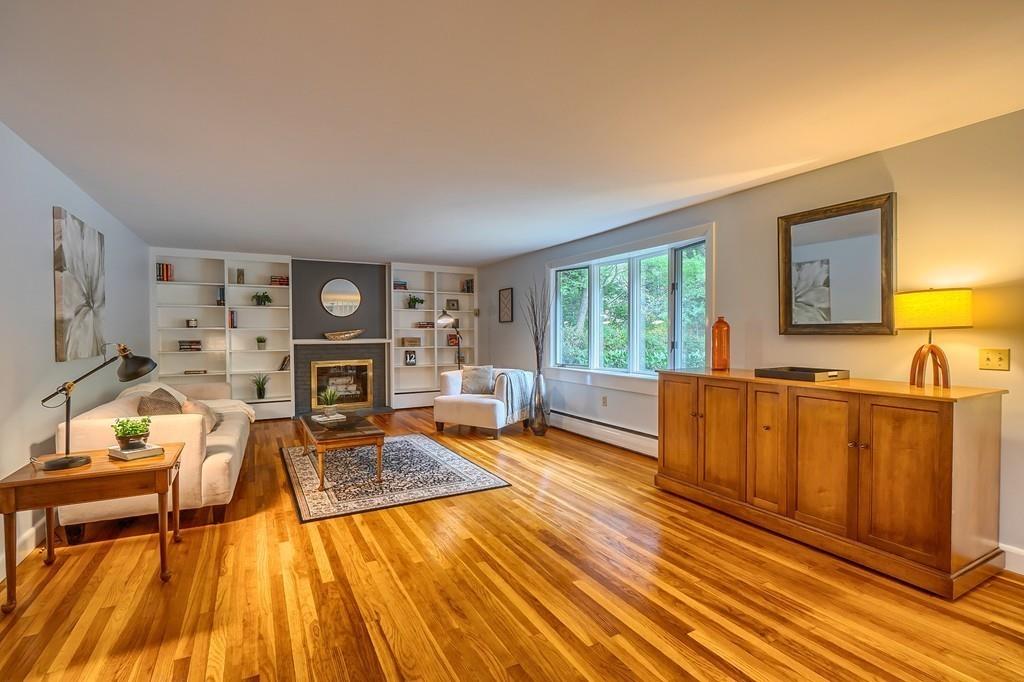 150 Pine Street Manchester, MA 01944 - Photo 4 of 38 a living room with furniture and a wooden floor