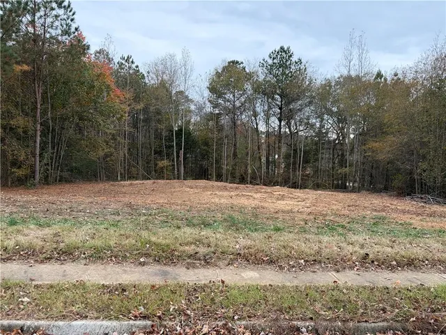 a street view with wooden fence