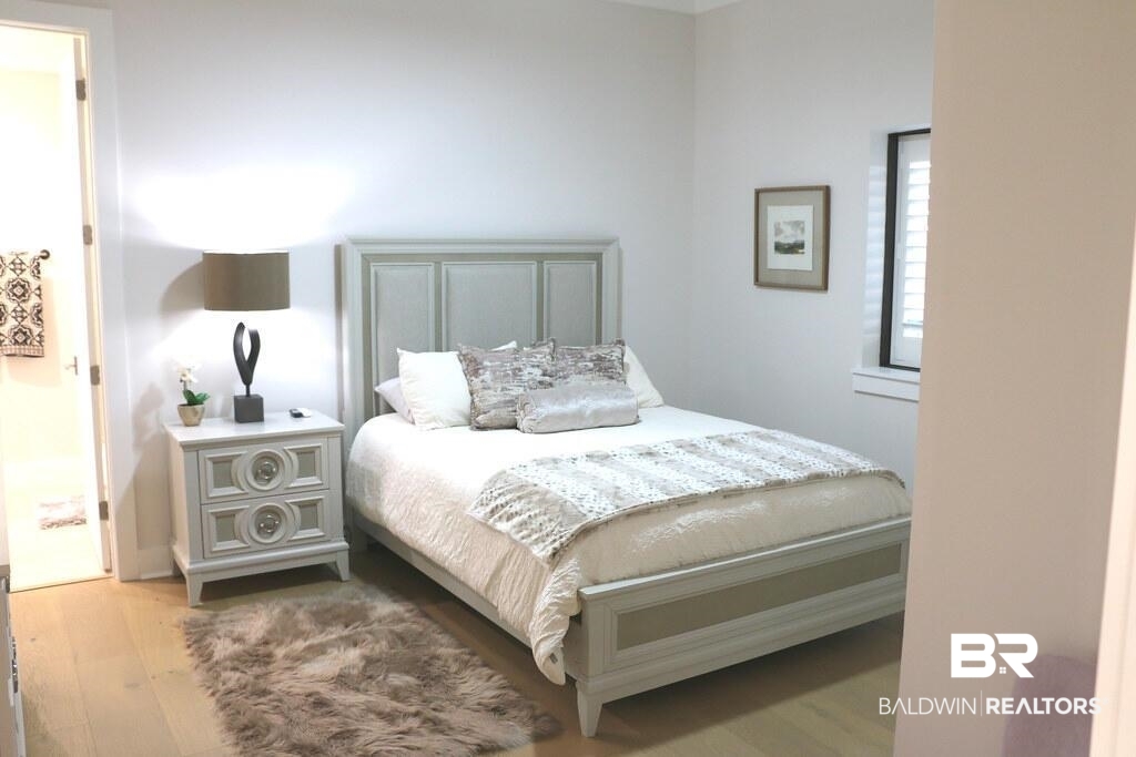 18269 Colony Drive, Unit 803 Fairhope, AL 36532 - Photo 19 of 27 Bedroom featuring light wood-style flooring