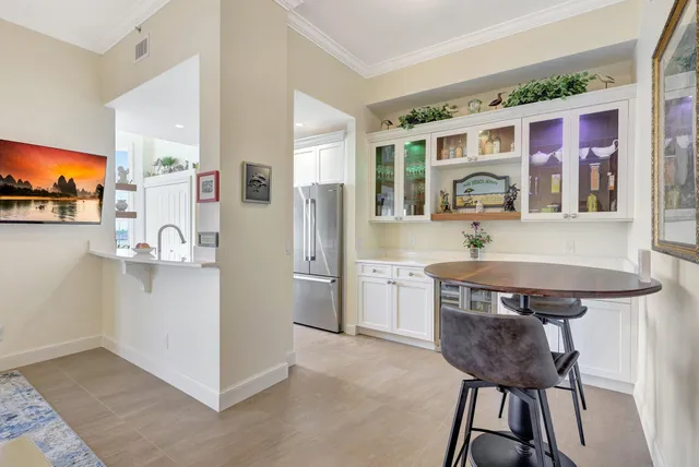 a view of kitchen island with furniture and wooden floor