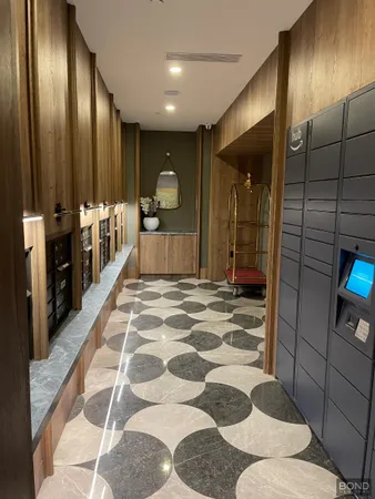 a bathroom with a sink and mirror