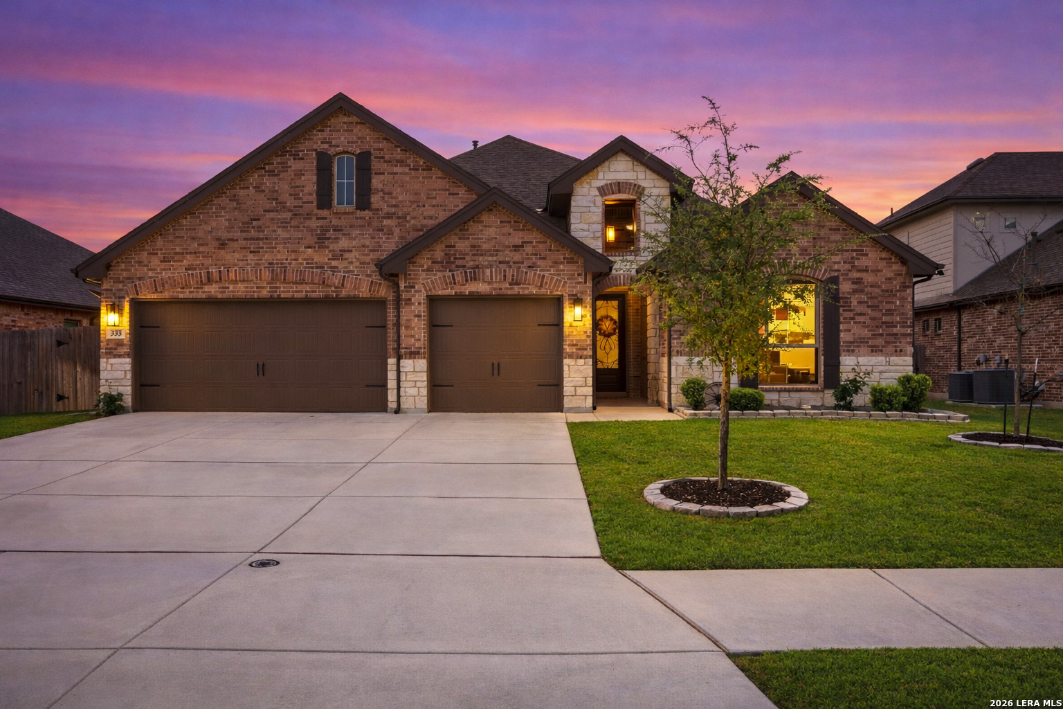 333 Misty Sails Cibolo, TX 78108 - Photo 1 of 1 a front view of a house with a garden