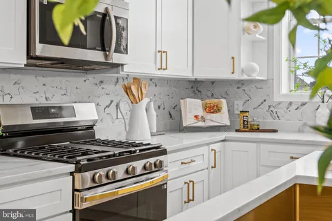 a bedroom with a bed and a table