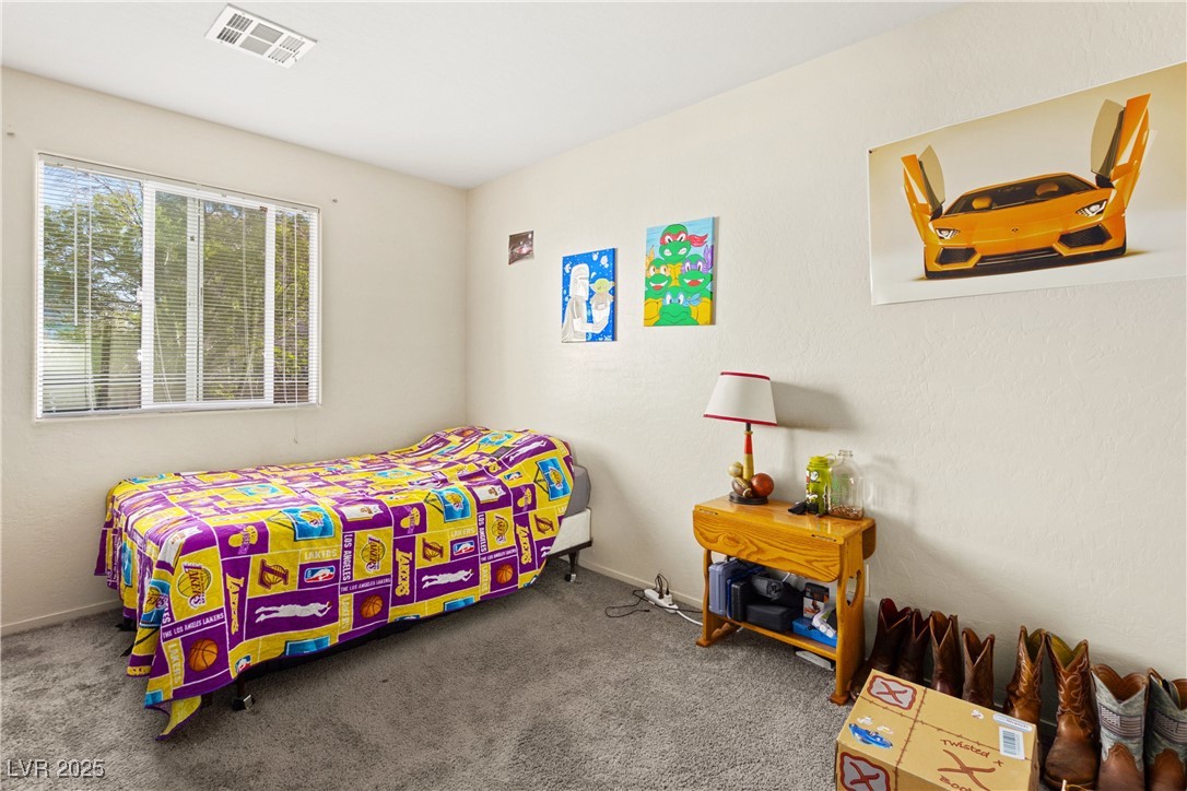 2664 Strichen Avenue Henderson, NV 89044 - Photo 18 of 25 Bedroom featuring baseboards, carpet floors, and v