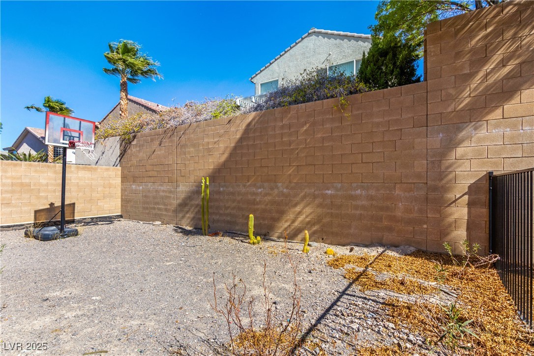 2664 Strichen Avenue Henderson, NV 89044 - Photo 24 of 25 View of yard with a fenced backyard