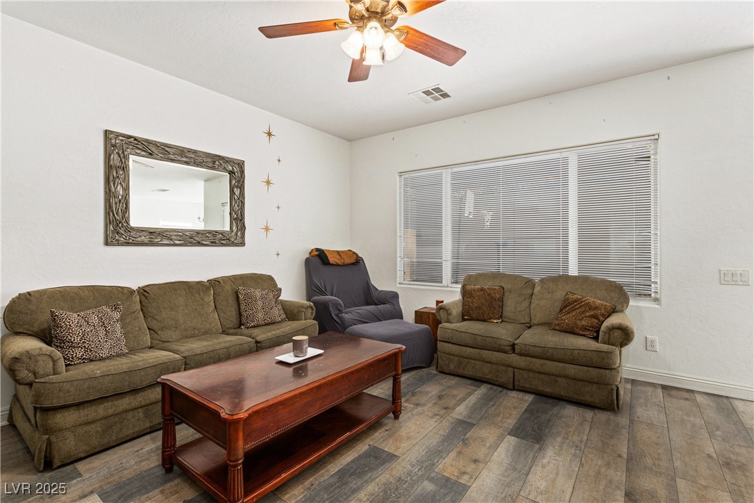 2664 Strichen Avenue Henderson, NV 89044 - Photo 4 of 25 Living room with hardwood / wood-style floors, bas