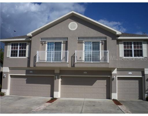 27715 Pleasure Ride Loop Wesley Chapel, FL 33544 - Photo 1 of 1 a front view of a house with entryway