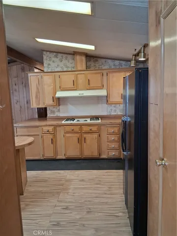 a view of kitchen and utility room